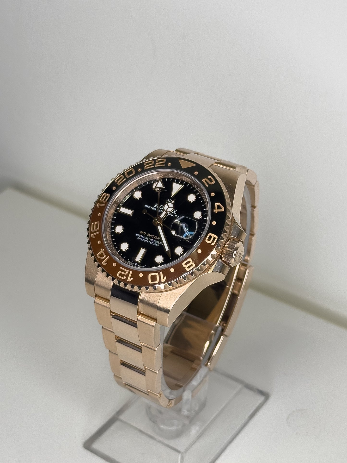ROLEX GMT-MASTER II - ROSE GOLD - BLACK DIAL - BLACK AND BROWN BEZEL