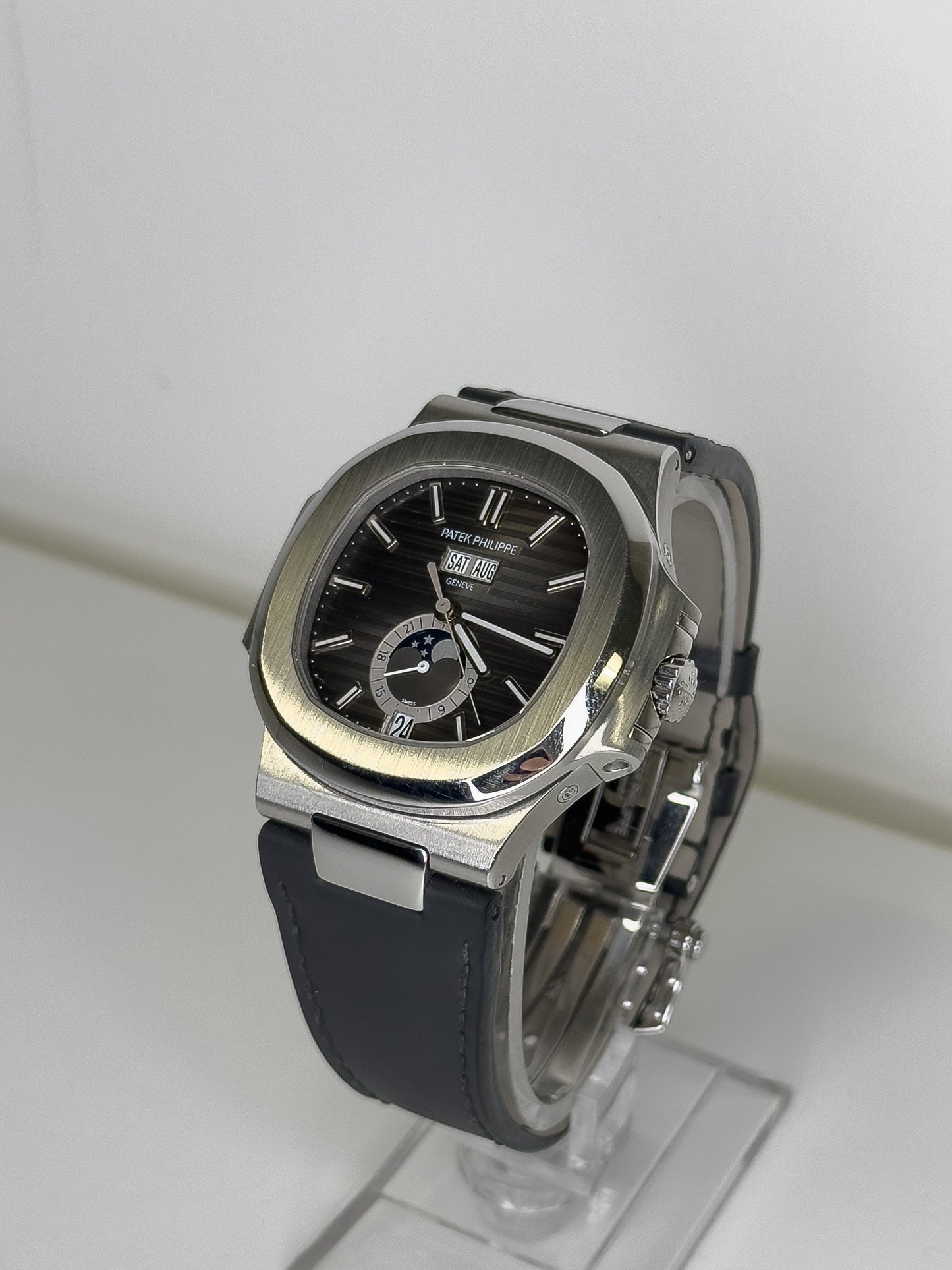 PATEK PHILIPPE NAUTILUS - STEEL AND LEATHER - BLACK DIAL