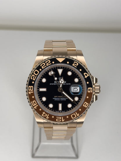ROLEX GMT-MASTER II - ROSE GOLD - BLACK DIAL - BLACK AND BROWN BEZEL