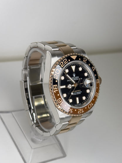 ROLEX GMT-MASTER II - OYSTERSTEEL & ROSE GOLD - BLACK DIAL - BLACK AND BROWN BEZEL