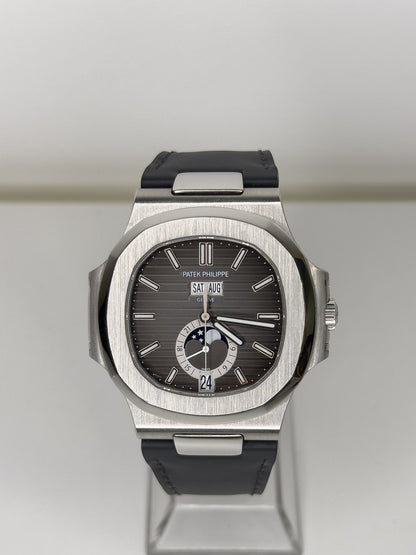 PATEK PHILIPPE NAUTILUS - STEEL AND LEATHER - BLACK DIAL