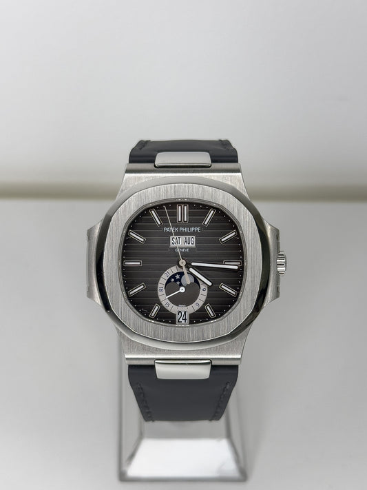 PATEK PHILIPPE NAUTILUS - STEEL AND LEATHER - BLACK DIAL